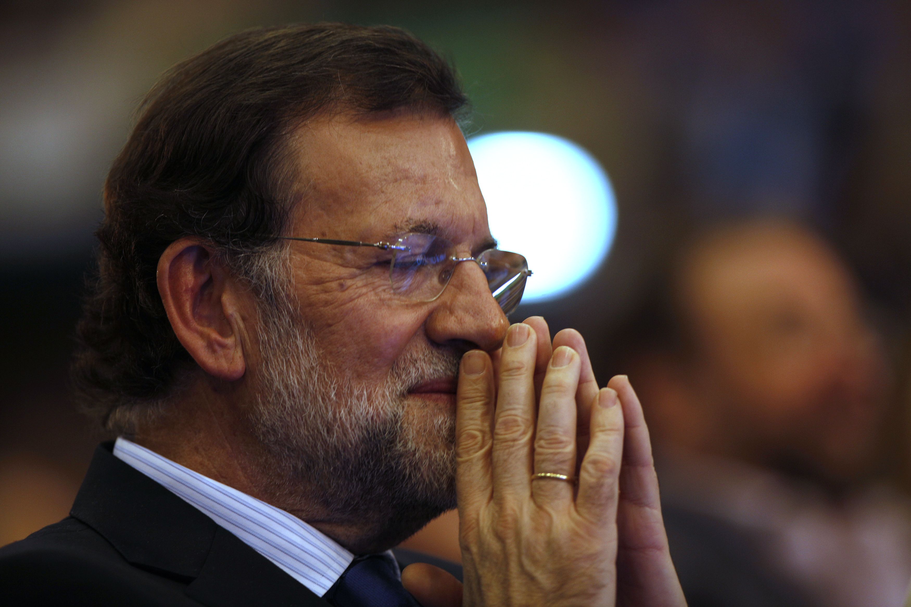 Mariano Rajoy, the leader of Spain's centre-right opposition People's Party gestures during a electoral campaign rally in Malaga